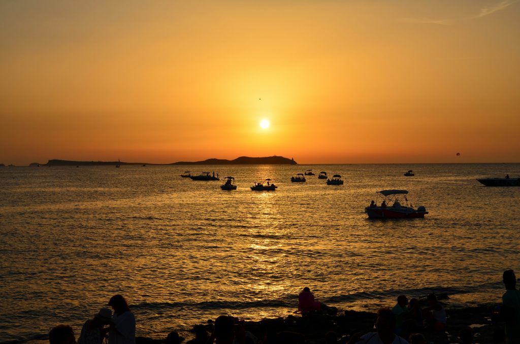 experience Ibiza sunset in summer